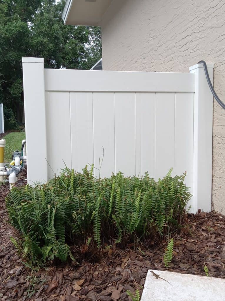 trash and a/c enclosure fence